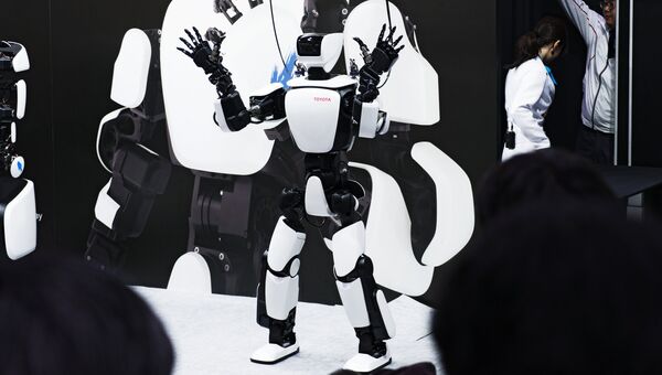 Робот на международной выставке роботов в Токио. Архивное фото