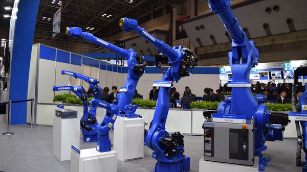 Промышленные роботы на международной выставке роботов IREX в Токио