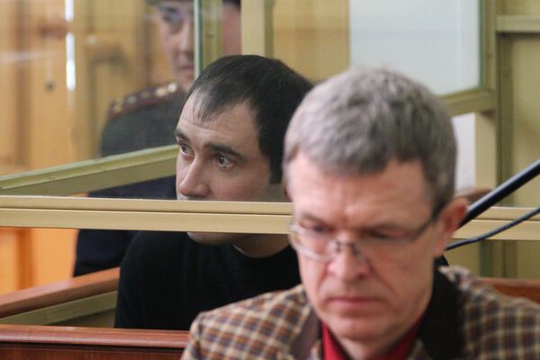Сергей Синельник, обвиняемый в бандитизме и убийствах, во время судебного заседания в Ростовском областном суде. 24 февраля 2016 года Сергей Синельник, обвиняемый в бандитизме и убийствах, во время судебного заседания в Ростовском областном суде. 24 февраля 2016 года