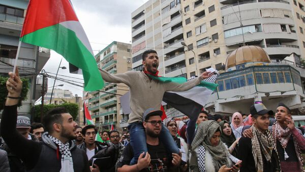 Палестинские студенты во время протеста против решения Дональда Трампа признать Иерусалим столицей Израиля. Архивное фото