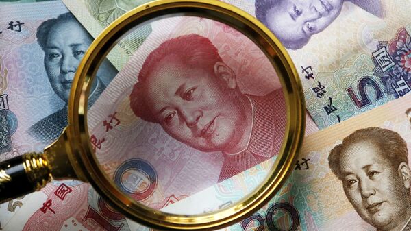 Китайские банкноты номиналом в 100, 50, 20,10 и 5 юаней