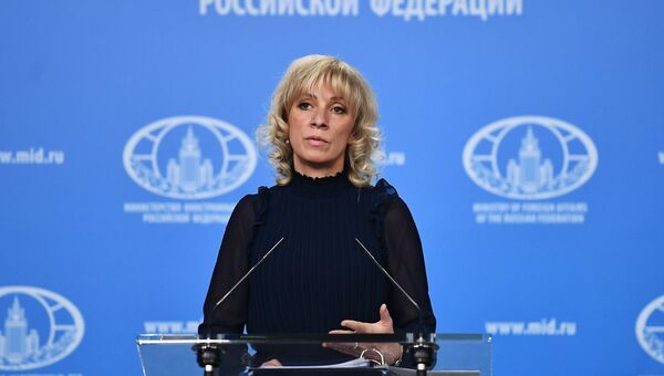 Официальный представитель министерства иностранных дел России Мария Захарова во время брифинга в Москве. 13 декабря 2017