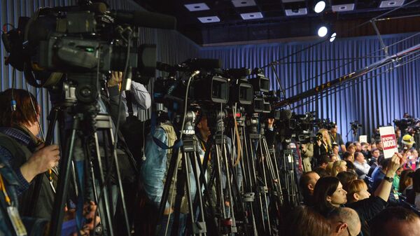 Журналисты на одиннадцатой большой ежегодной пресс-конференции президента России Владимира Путина