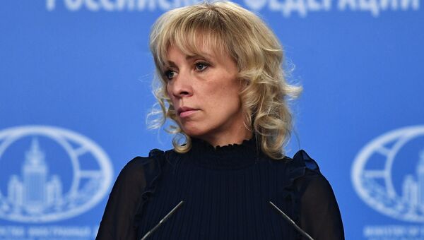 Официальный представитель министерства иностранных дел России Мария Захарова во время брифинга в Москве. 13 декабря 2017