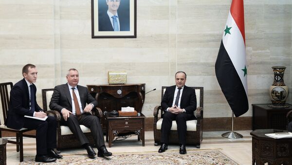 Вице-премьер РФ Дмитрий Рогозин и председатель Совета министров Сирии Имад Хамис во время встречи. 18 декаюря 2017