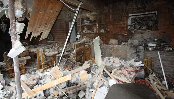 Комната в жилом доме в центре города Ясиноватая, пострадавшего в результате обстрела. 21 декабря 2017