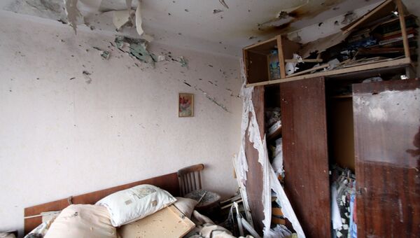 Комната в жилом доме в центре города Ясиноватая, пострадавшем в результате обстрела. 21 декабря 2017