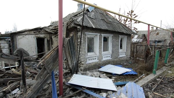 Частный жилой дом в городе Ясиноватая, пострадавший в результате обстрела. 21 декабря 2017