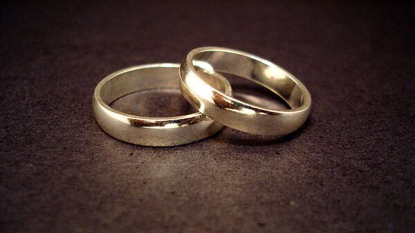 Свадебные кольца, архивное фото
