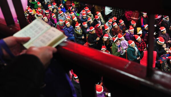 Китайские христиане во время рождественской мессы в провинции Аньхой