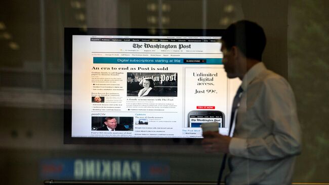 Сайт газеты Washington Post на экране в здании редакции