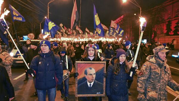 Активисты различных националистических партий во время митинга в честь 109-летия Степана Бандеры в Киеве, Украина. 1 января 2018