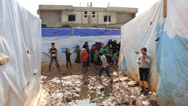 Сирийские дети в лагере беженцев на севере Ливана. Архивное фото