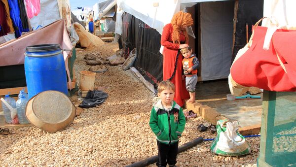 Сирийские дети в лагере беженцев на севере Ливана. 16 января 2018