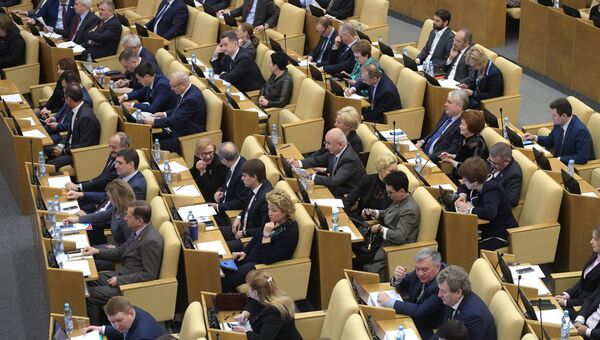 Депутаты на пленарном заседании Государственной Думы РФ