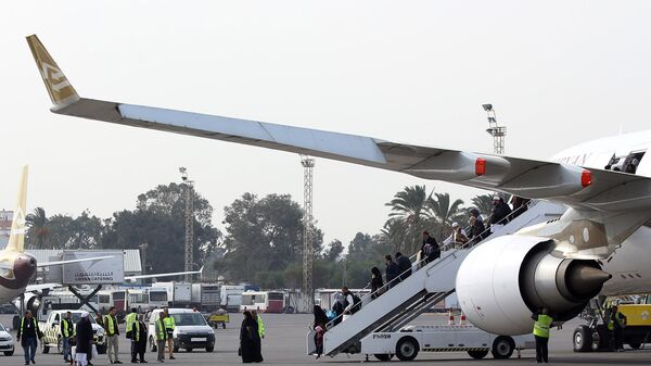 Пассажиры в аэропорту Митига в Триполи, Ливия. 20 января 2018
