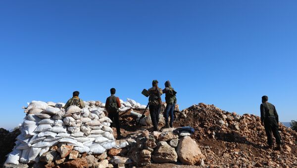 Cирийские повстанцы у курдского анклава Африн. Архивное фото