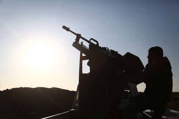 Бойцы Свободной сирийской армии занимают позиции в районе города Тал Малид
