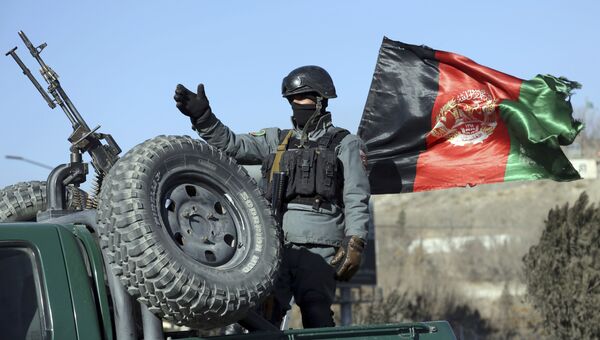 Афганский военный рядом с отелем Intercontinental Hotel в Кабуле. 21 января 2018