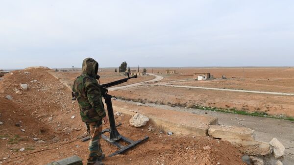 Сирийский военнослужащий в провинции Идлиб, Сирия. Архивное фото