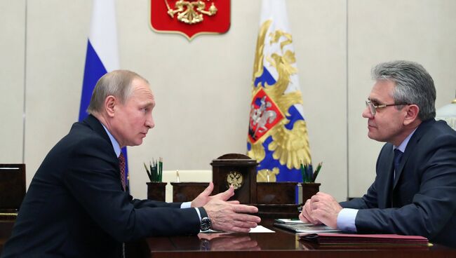 Президент РФ Владимир Путин и президент Российской академии наук Александр Сергеев во время встречи. 22 января 2018