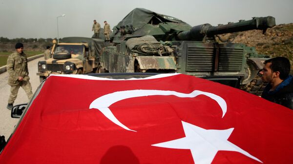Турецкая военная техника в районе границы между Турцией и Сирией