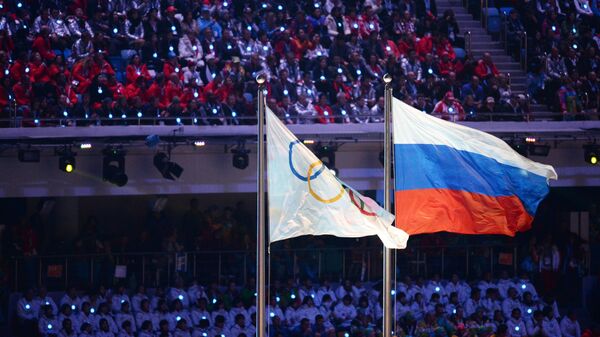 Олимпийский флаг и флаг России на Играх в Сочи