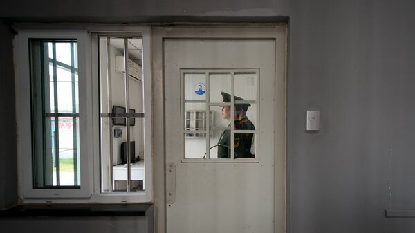 Охрана в Центре для заключенных в Пекине