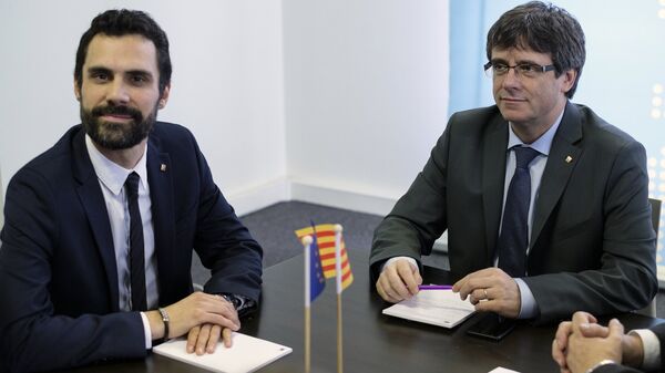 Спикер парламента Каталонии Роже Торрен и экс-председатель каталонского правительства Карлес Пучдемон