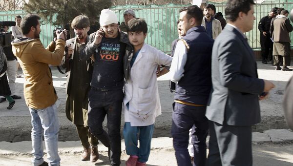 Пострадавшие от взрыва в Кабуле, Афганистан. 27 января 2018