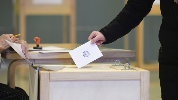 Избиратель во время президентских выборов, Хельсинки. 28 января 2018
