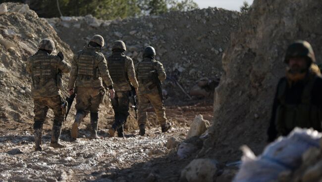 Бойцы Свободной сирийской армии на высоте Бурсея в сирийском Африне. 28 января 2018