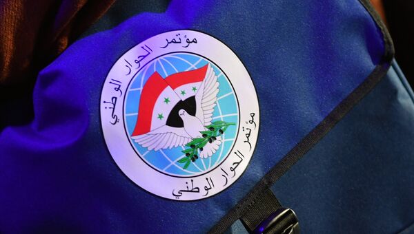 Эмблема конгресса сирийского национального диалога, который проходит в Сочи. 30 января 2018