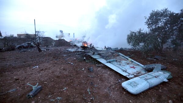 Обломки сбитого боевиками российского самолета Су-25 в Сирии. 3 февраля 2018