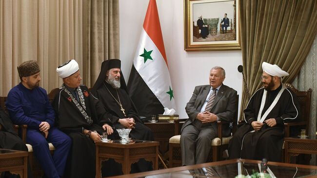 Верховный муфтий Сирии Ахмад Бадреддин Хассун во время встречи с межконфессиональной делегацией религиозных деятелей из России в Дамаске. 5 февраля 2018