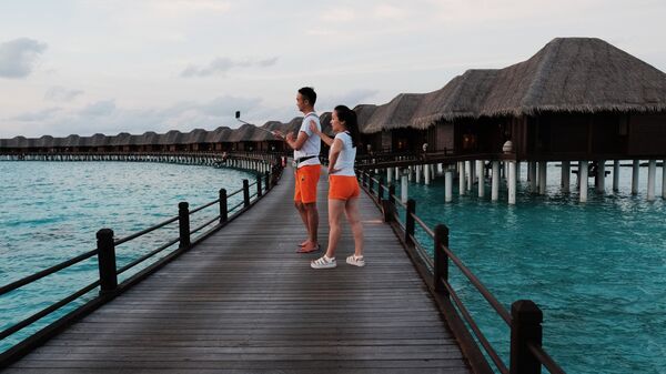 Отдыхающие в отеле Sun Aqua Vilu Reef 5* на одном из Мальдивских островов