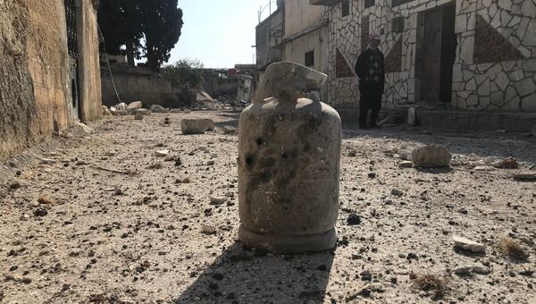Последствия обстрела турецкими военными поселения Дженджерес в кантоне Африн на севере Сирии. Архивнео фото