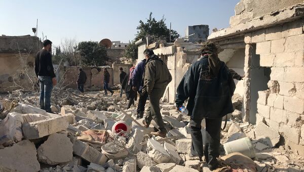 Поселение Дженджерес в кантоне Африн на севере Сирии после авиационного и артиллерийского обстрела со стороны Вооруженных сил Турции
