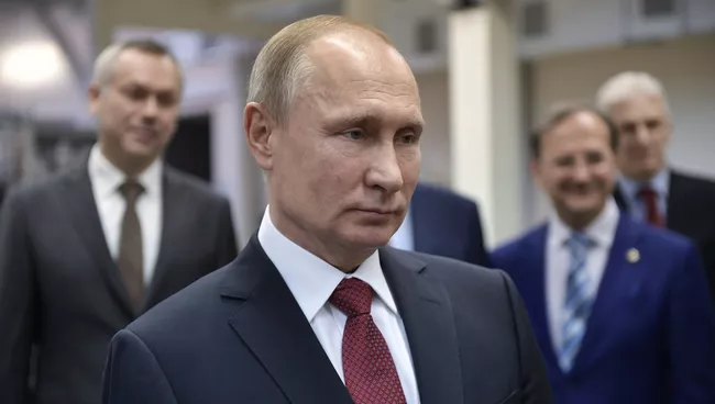 Президент РФ Владимир Путин во время посещения Института ядерной физики имени Г. И. Будкера в Новосибирске. 8 февраля 2018