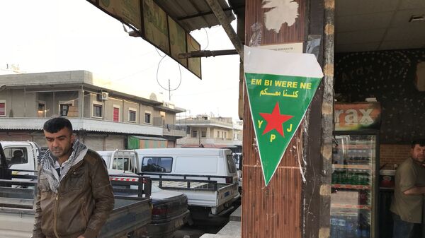 Флаг курдских сил самообороны (YPJ)