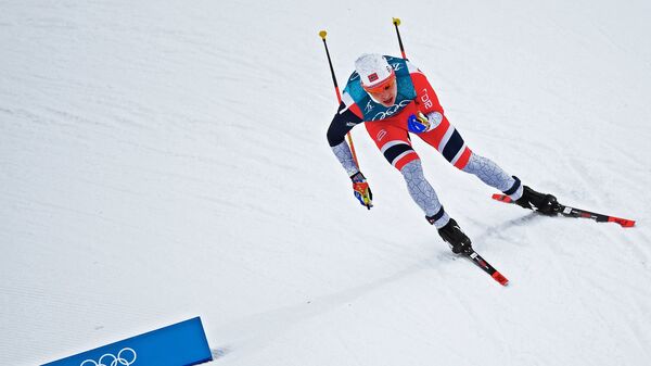 Симен Хегстад Крюгер (Норвегия) на дистанции скиатлона среди мужчин в соревнованиях по лыжным гонкам на XXIII зимних Олимпийских играх в Пхенчхане. 11 февраля 2018