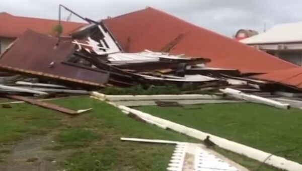 Разрушенное здание парламента островного государства Тонга