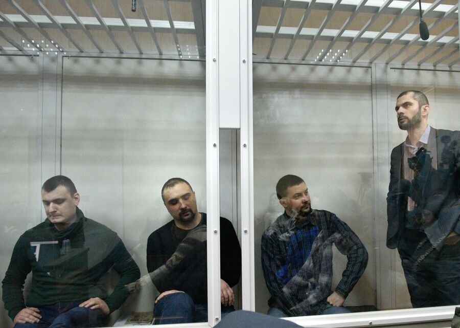 Бывшие бойцы спецподразделения МВД Беркут во время заседания в Святошинском районном суде Киева. 13 февраля 2018