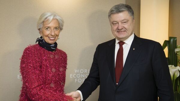 Директор-распорядитель МВФ Кристин Лагард и президент Украины Петр Порошенко на Всемирном экономическом форуме в Давосе. 25 января 2018 года