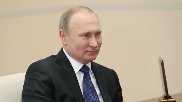Президент РФ Владимир Путин во в ремя встречи с губернатором Иркутской области Сергеем Левченко. 19 февраля 2018