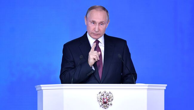 Президент РФ Владимир Путин выступает с ежегодным посланием Федеральному Собранию в ЦВЗ Манеж. 1 марта 2018