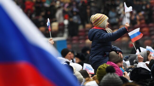 Участники митинга в поддержку кандидата в президенты РФ Владимира Путина За сильную Россию!. 3 марта 2018