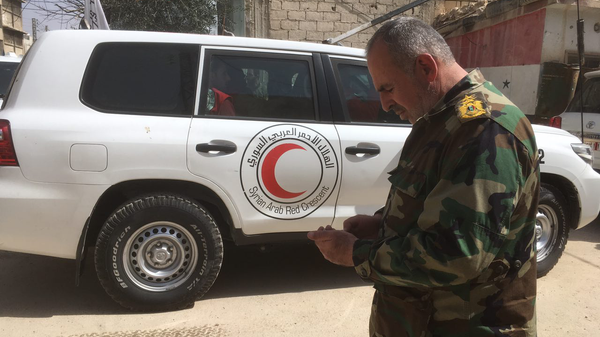 Гуманитарный конвой Красного полумесяца в Восточной Гуте, Сирия. 5 марта 2018