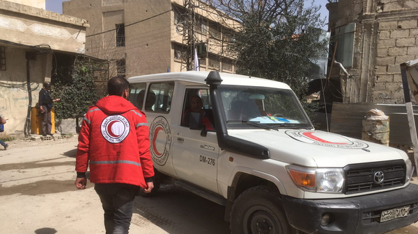 Гуманитарный конвой Красного полумесяца в Восточной Гуте, Сирия. 5 марта 2018
