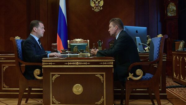 Председатель правительства РФ Дмитрий Медведев и председатель правления компании Газпром Алексей Миллер во время встречи. 13 марта 2018